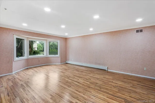 $1,699,999 | 418 Old Courthouse Road, Manhasset Hills, NY 11040