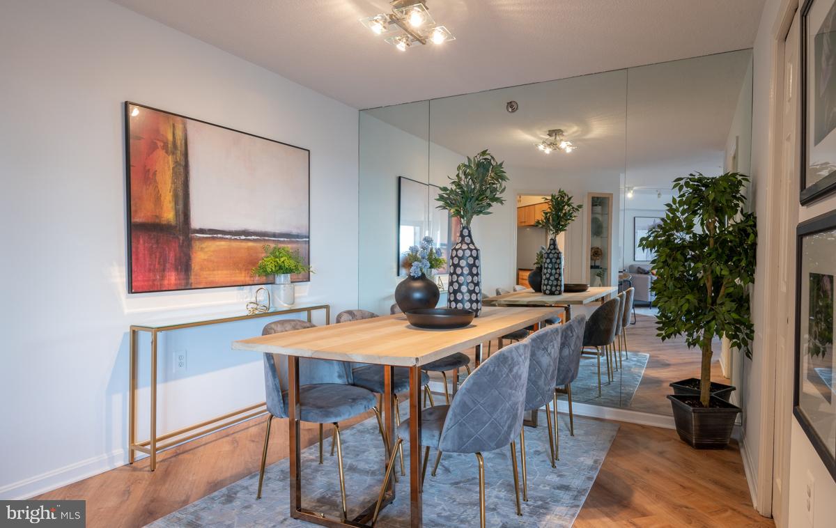 1301 North Courthouse Road, Unit 1106 Arlington, VA 22201 - Photo 17 of 48 Formal and yet cozy - dining room with accent wall