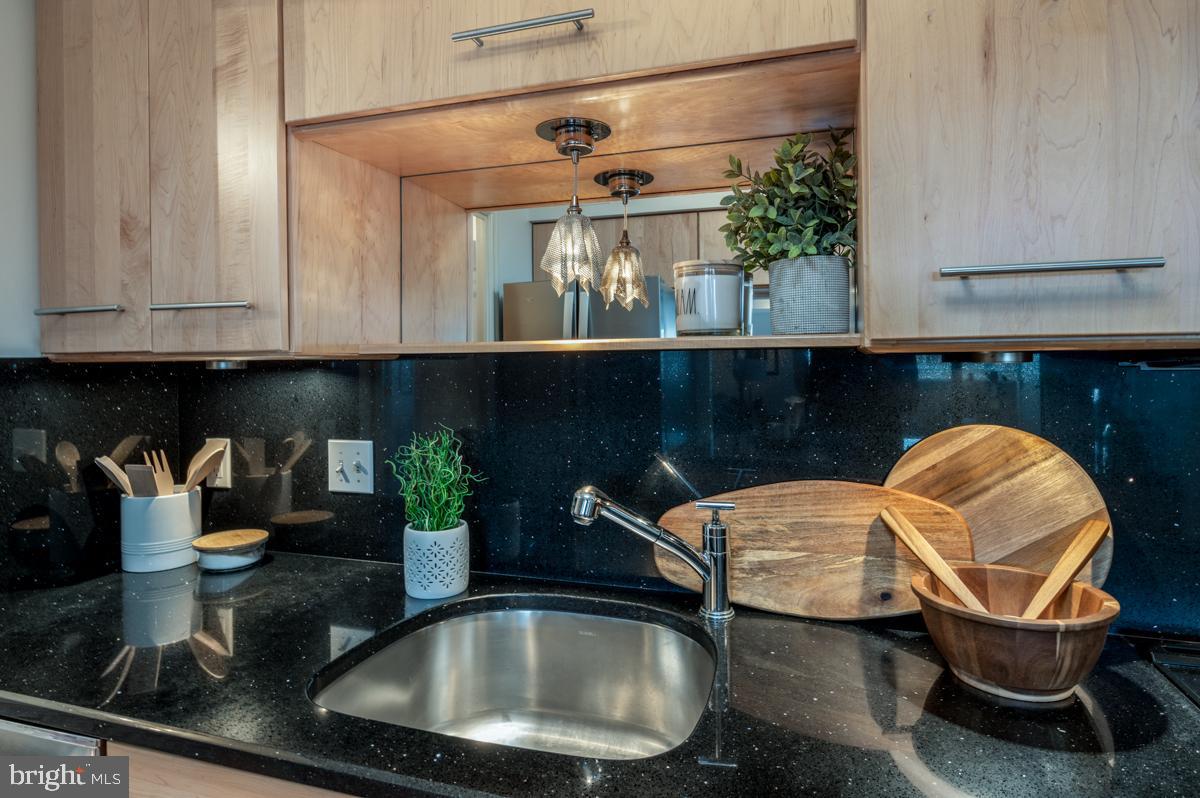 1301 North Courthouse Road, Unit 1106 Arlington, VA 22201 - Photo 21 of 48 Maple cabinetry and stainless steel sink