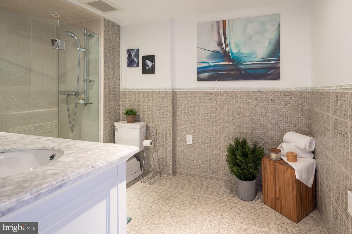 1301 North Courthouse Road, Unit 1106 Arlington, VA 22201 - Photo 26 of 48 Luxury bathroom adjacent to main bedroom