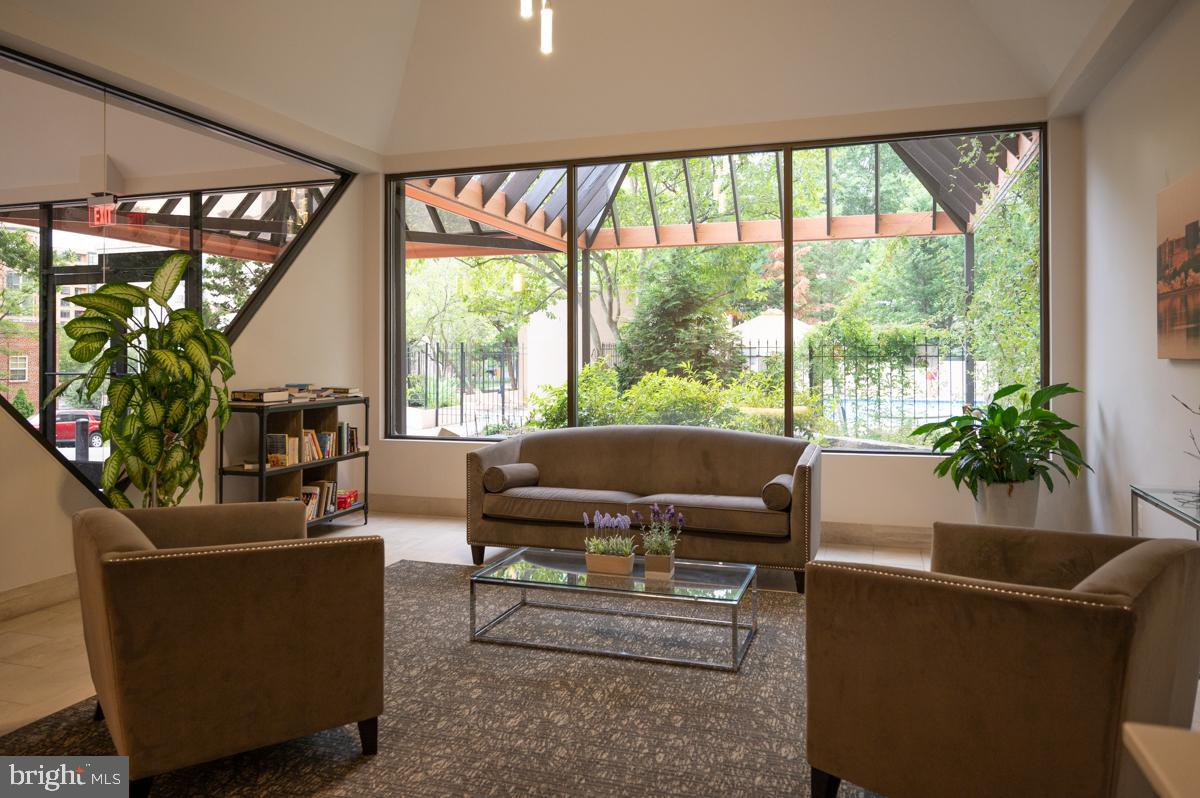 1301 North Courthouse Road, Unit 1106 Arlington, VA 22201 - Photo 41 of 48 Inviting lobby seating area with library