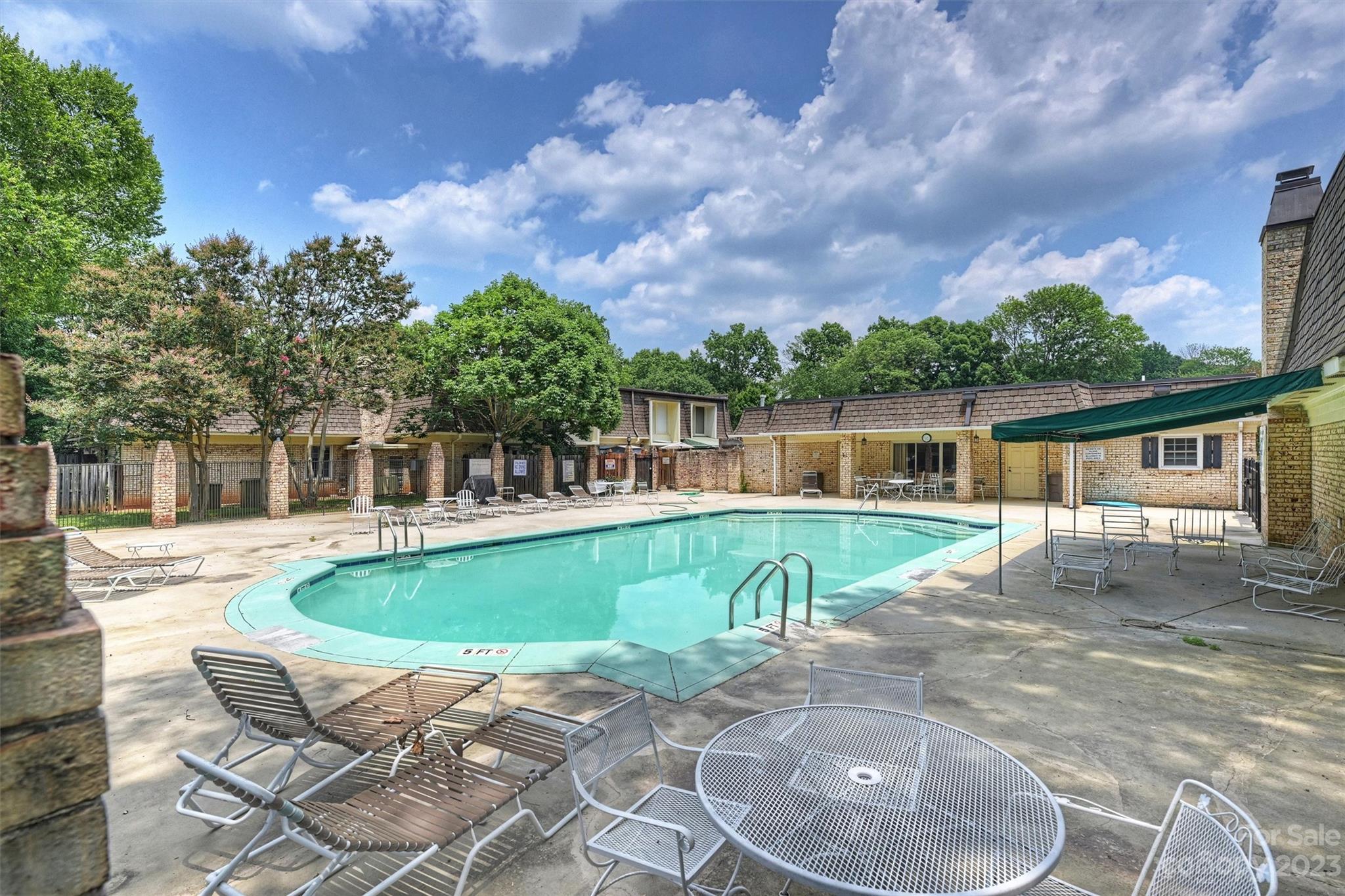1712 Roxborough Road Charlotte, NC 28211 - Photo 44 of 44 a view of a house with pool