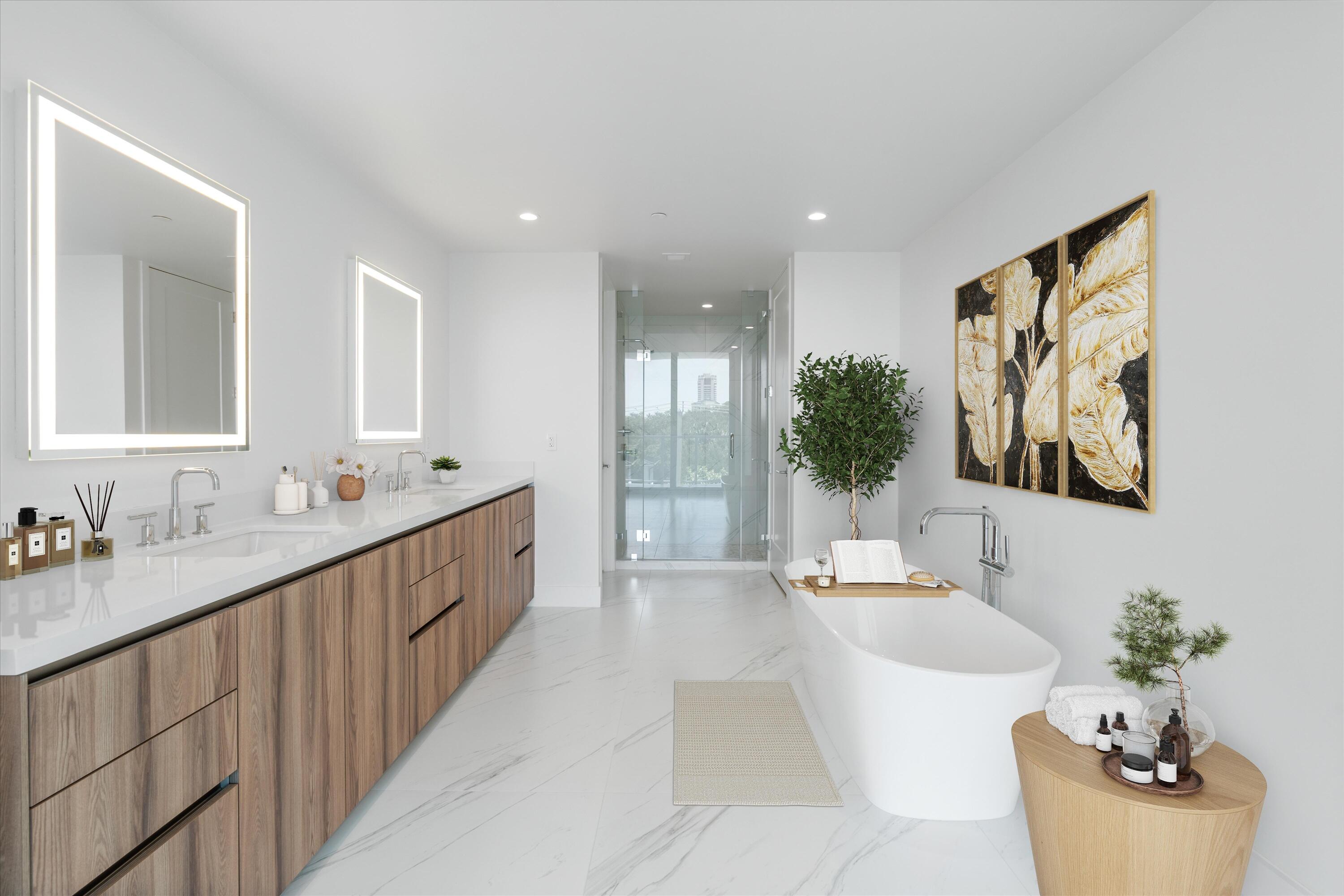 495 East Royal Palm Road, Unit 402 Boca Raton, FL 33432 - Photo 22 of 72 a bathroom with a double vanity sink mirror and bathtub