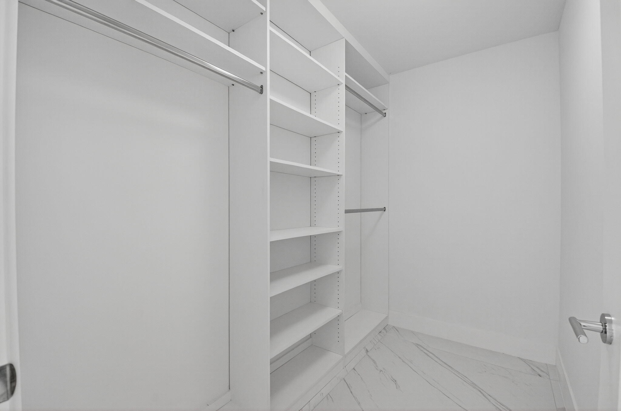 495 East Royal Palm Road, Unit 402 Boca Raton, FL 33432 - Photo 25 of 72 a view of an empty walk in closet