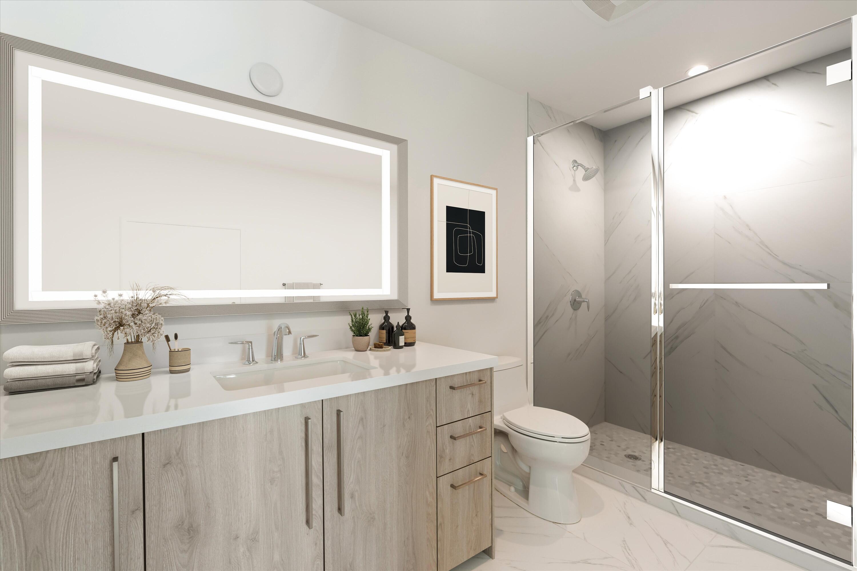 495 East Royal Palm Road, Unit 402 Boca Raton, FL 33432 - Photo 35 of 72 a bathroom with a sink a toilet and shower