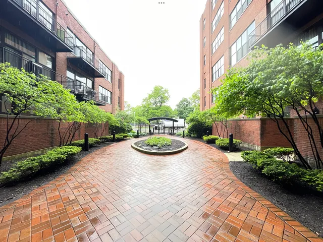 a view of swimming pool with a patio