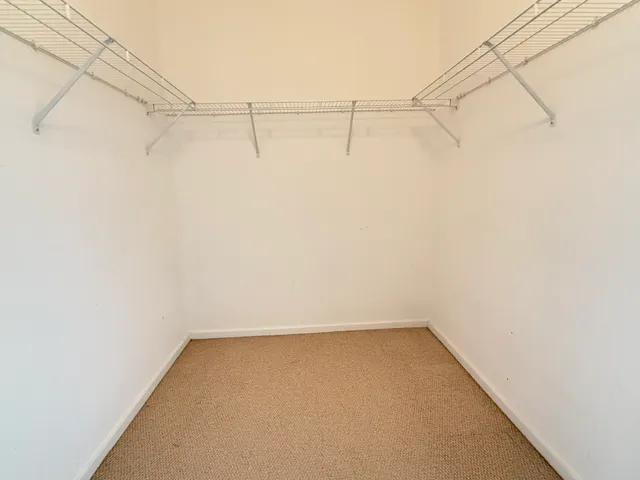 a view of a room with racks on the wall