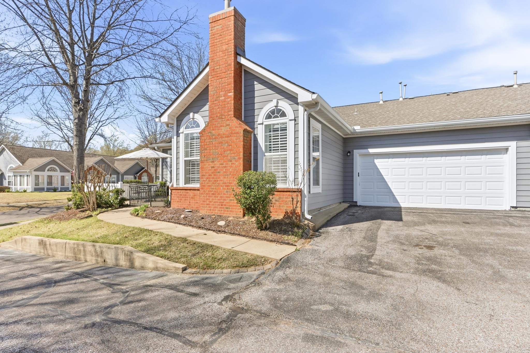 1075 Oak Timber Circle, Unit 69 Collierville, TN 38017 - Photo 3 of 35 a view of a house with snow on the road