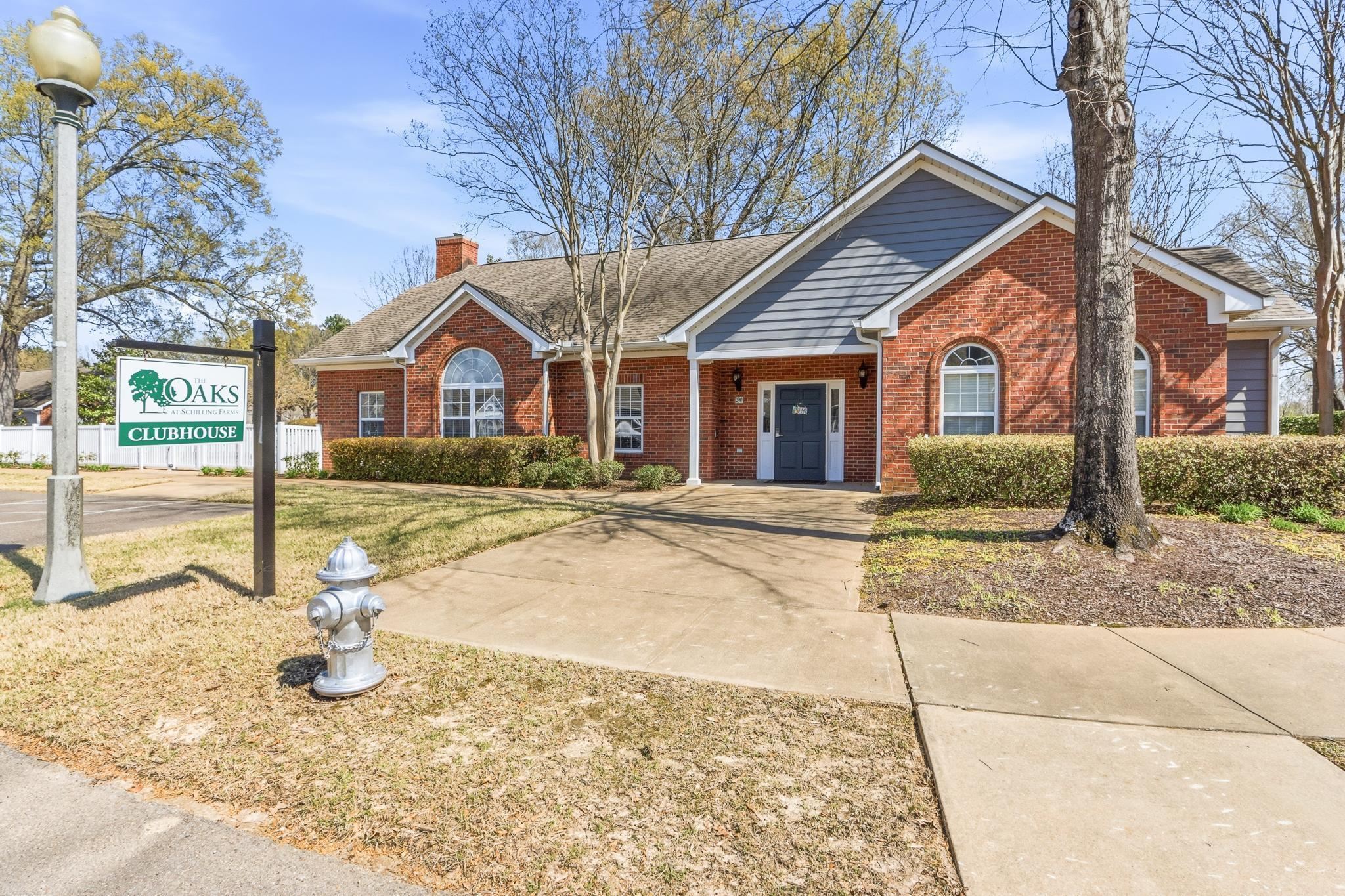 1075 Oak Timber Circle, Unit 69 Collierville, TN 38017 - Photo 32 of 35 a view of a house with snow on the side of the road