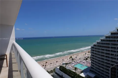a view of an ocean from a balcony