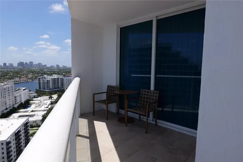 a view of balcony with chairs
