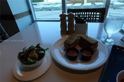 a table and chairs in a shelf