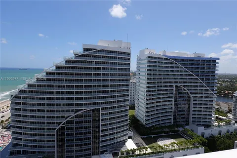 a view of a building with glass windows