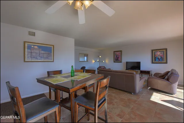 a view of a dining room with furniture