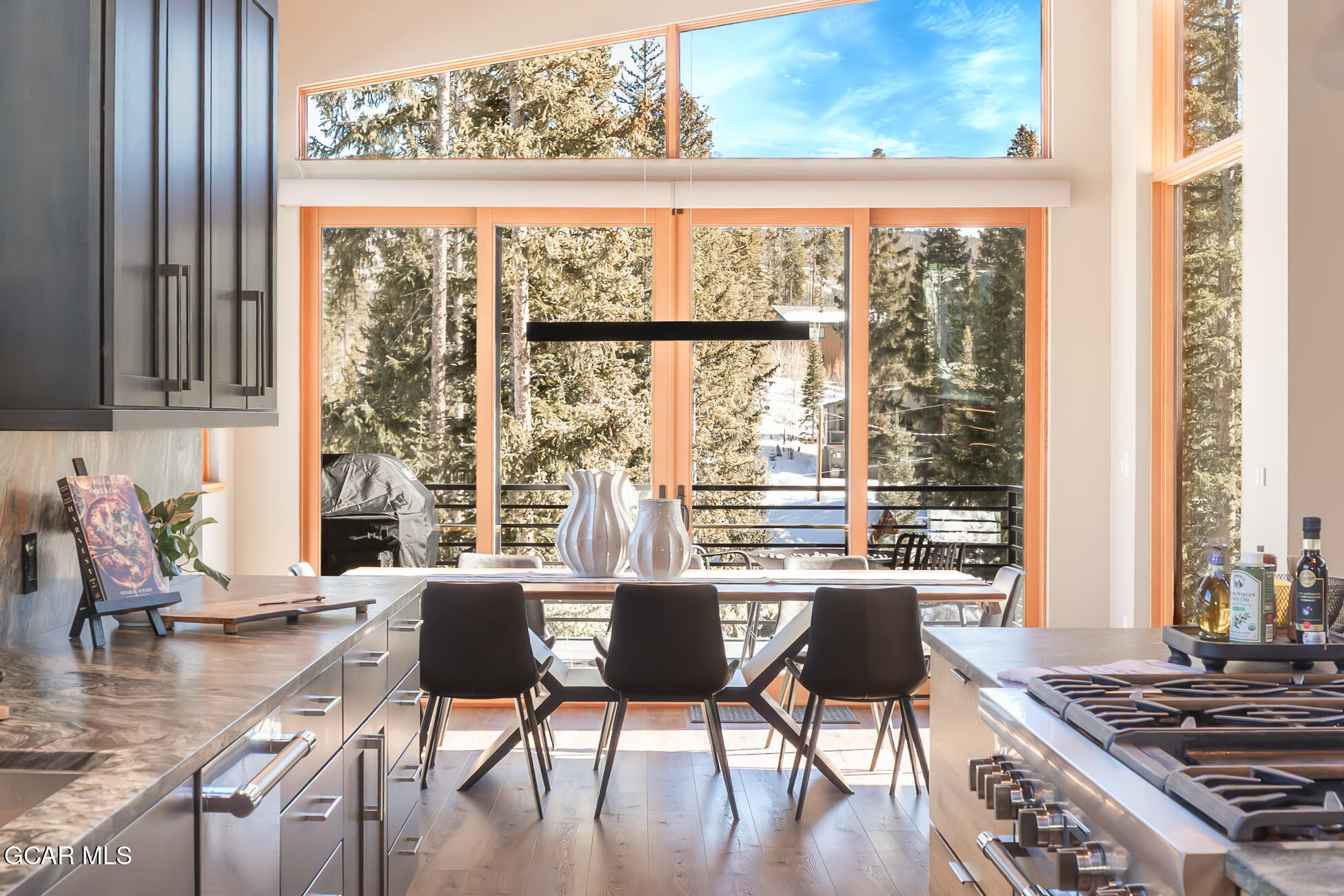 684 Vasquez Road Winter Park, CO 80482 - Photo 16 of 45 a view of a dining room with furniture window and outside view