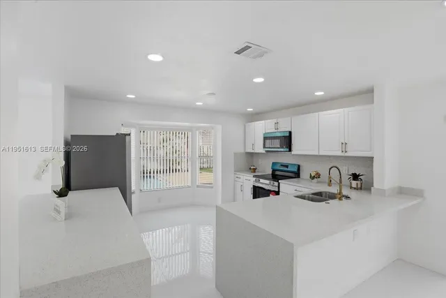 $675,000 | 13209 Northwest 12th Court, Sunrise, FL 33323