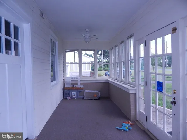 a room with furniture and window