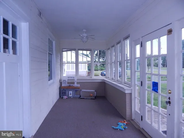 a room with furniture and window