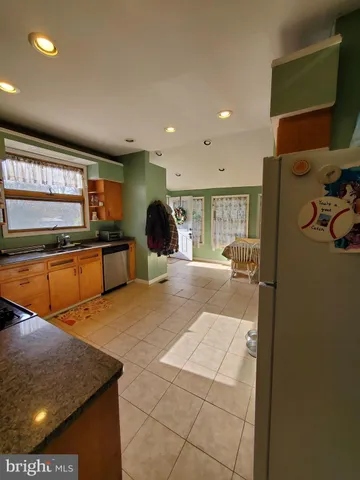 a lobby with furniture and window