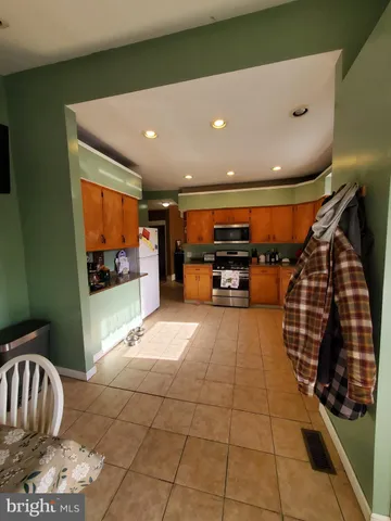 a room with lots of furniture and windows