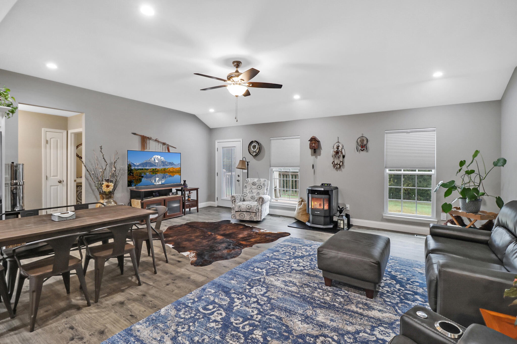 1095 Fugate Road Evensville, TN 37332 - Photo 15 of 50 a living room with furniture a fireplace and a flat screen tv