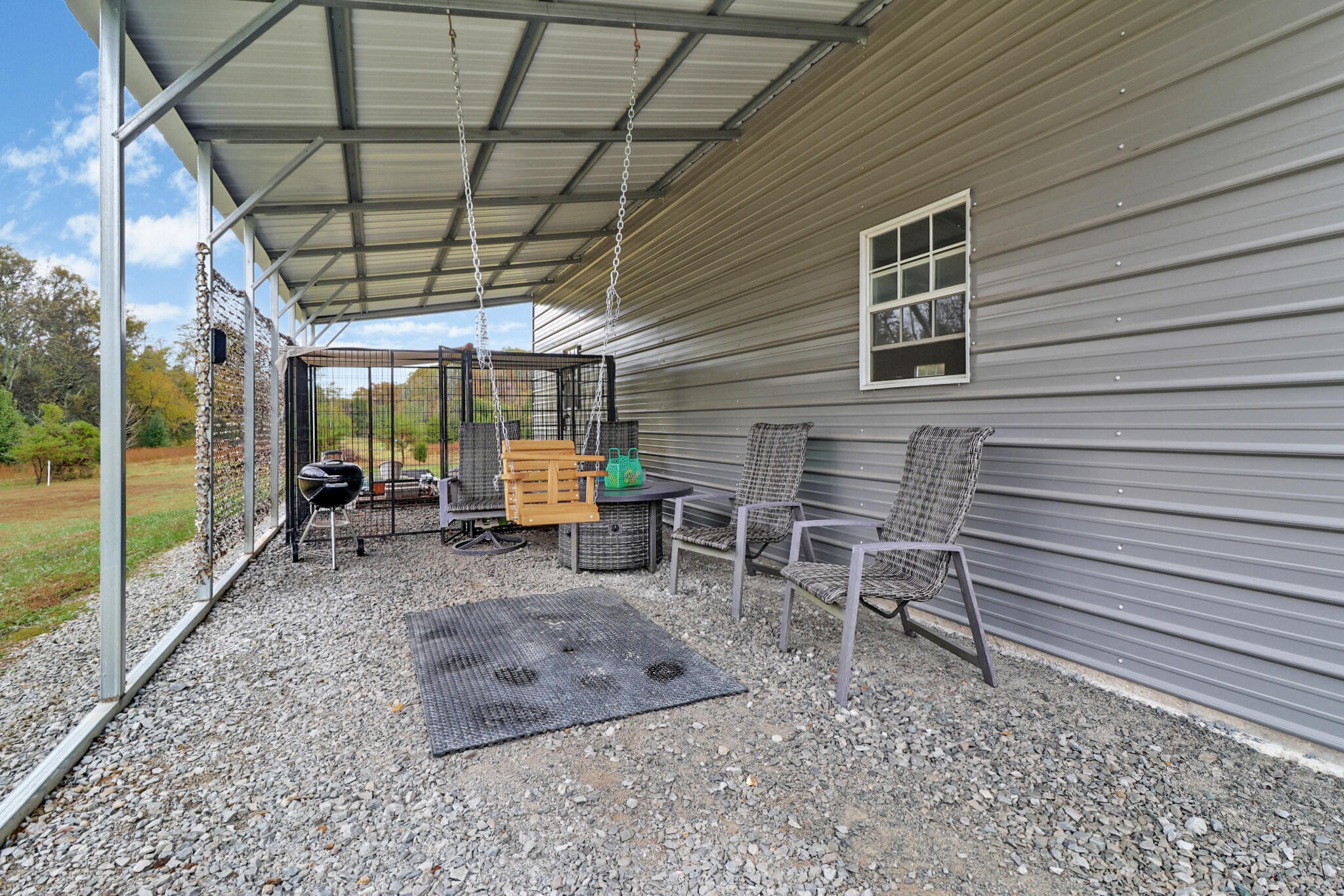 1095 Fugate Road Evensville, TN 37332 - Photo 47 of 50 a view of a couches table and chairs in patio