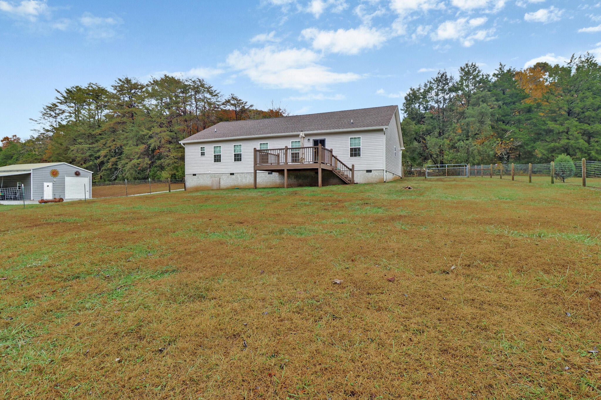 1095 Fugate Road Evensville, TN 37332 - Photo 49 of 50 a front view of house with yard and trees in the background