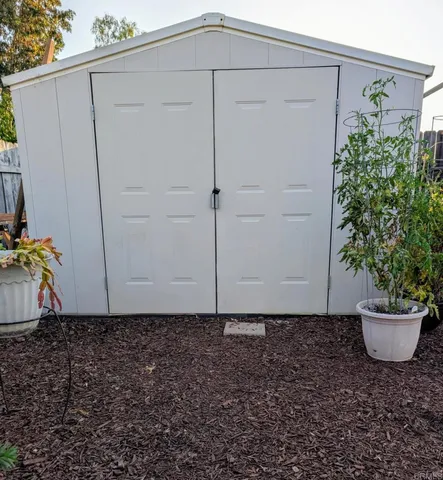 a view of a small space with potted plants