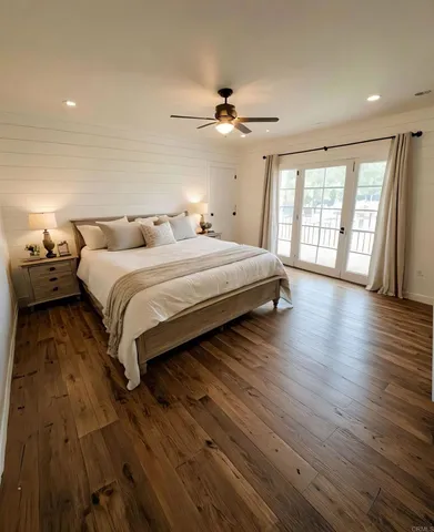 a bedroom with bed and window