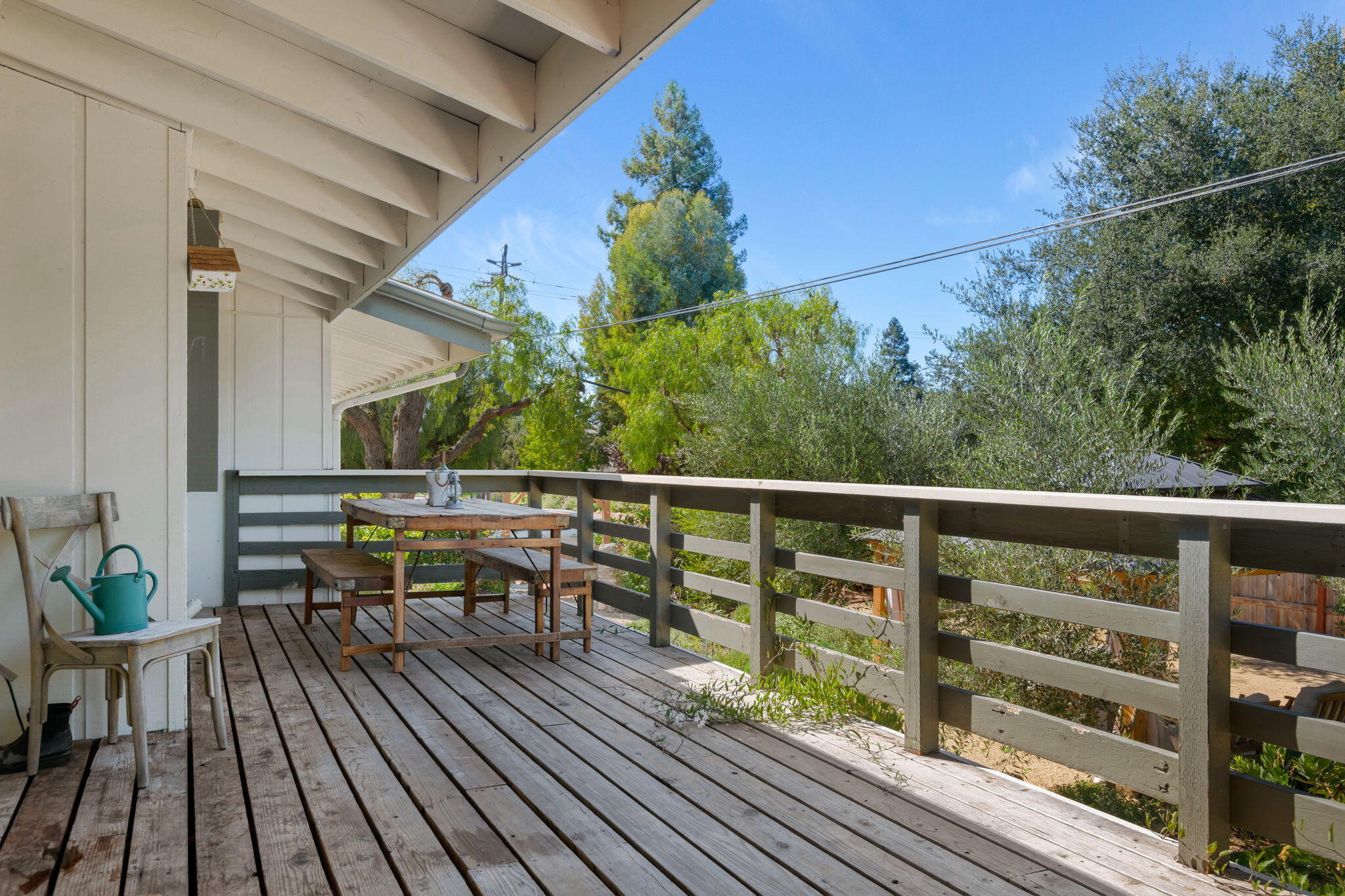2455 Lucca Avenue Los Olivos, CA 93441 - Photo 20 of 37 a view of a balcony with chairs and wooden floor