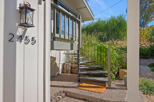 a kitchen with stainless steel appliances granite countertop a sink and stove top oven