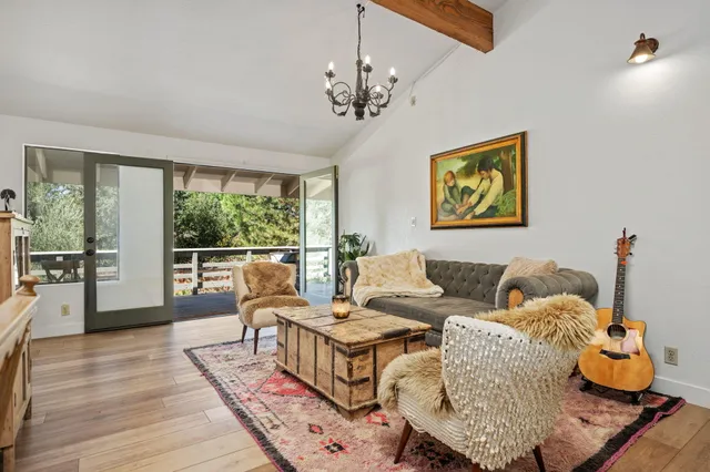 a living room with furniture and windows