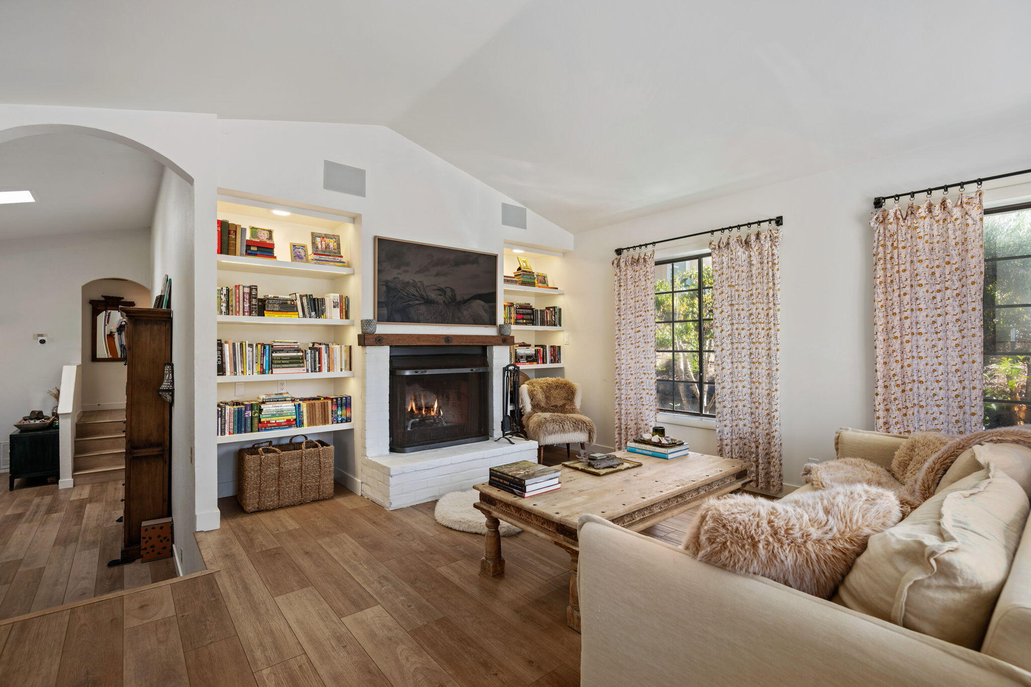 2455 Lucca Avenue Los Olivos, CA 93441 - Photo 10 of 37 a living room with furniture and a fireplace