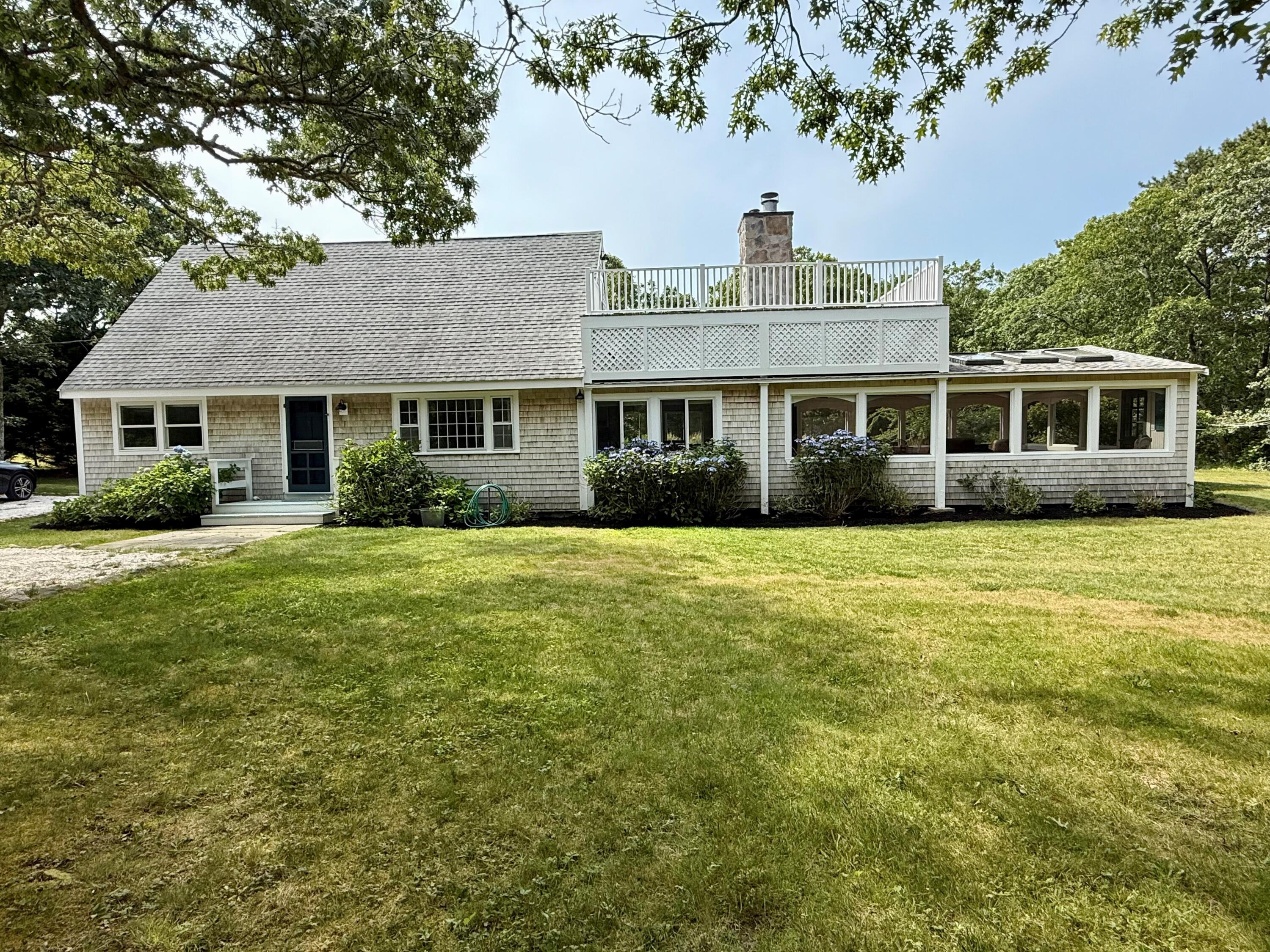 5 Pip'n Road Edgartown, MA 02539 - Photo 2 of 25 a front view of house with yard and green space