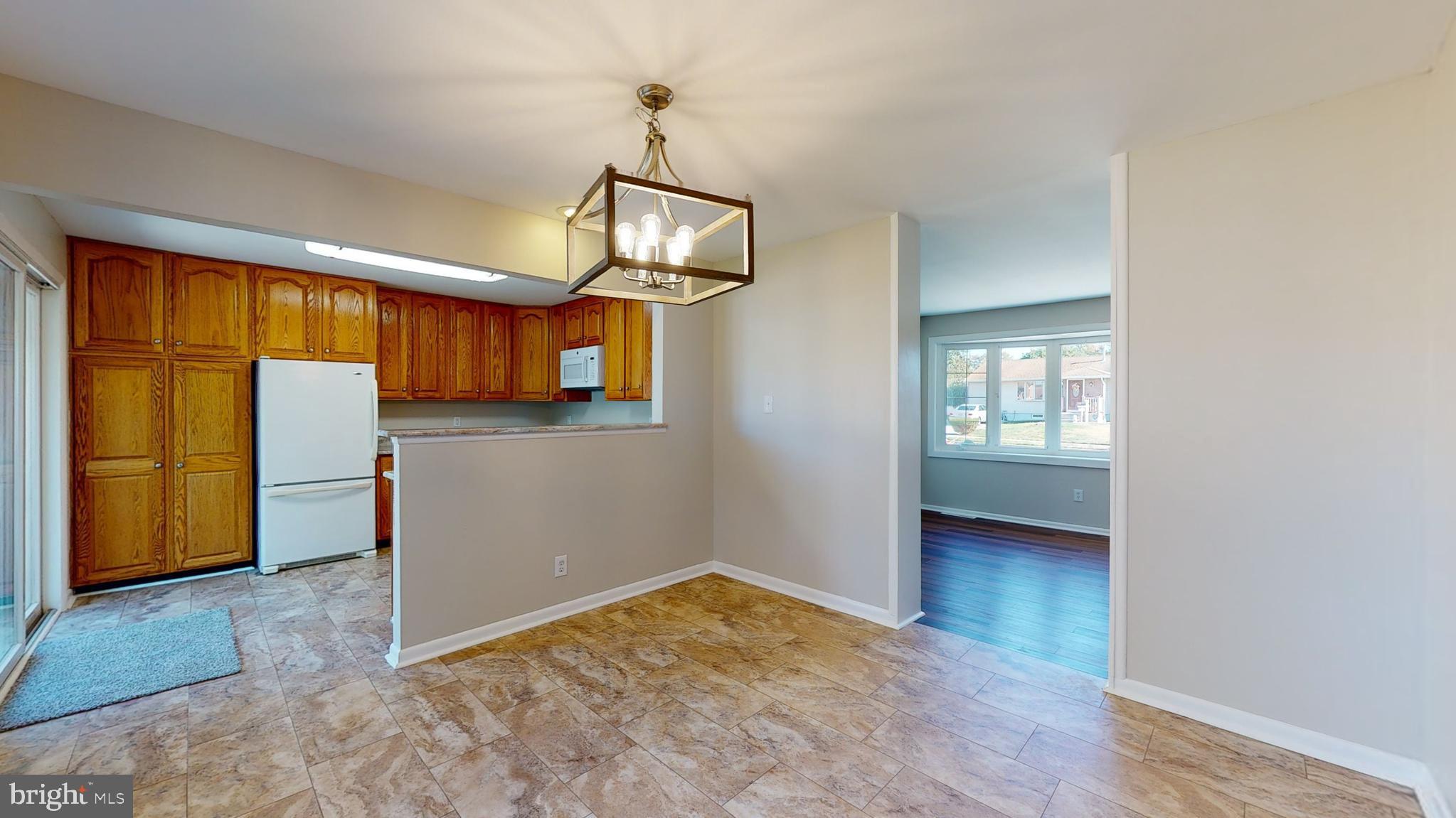 620 Franklin Road Wenonah, NJ 08090 - Photo 8 of 28 a view of empty room with wooden floor and fan