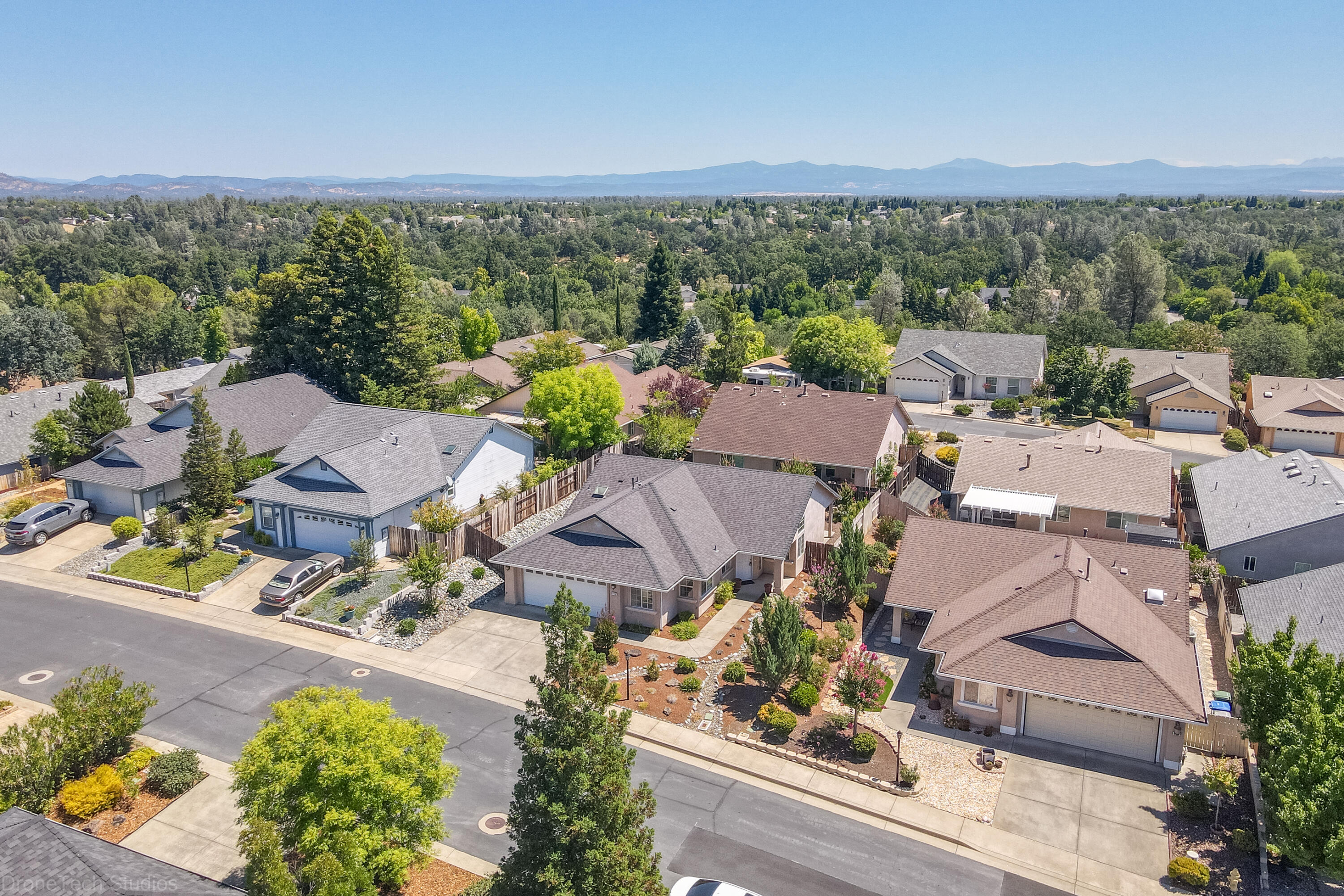662 Volcano View Trail Redding, CA 96003 - Photo 22 of 26 an aerial view of a house with a garden