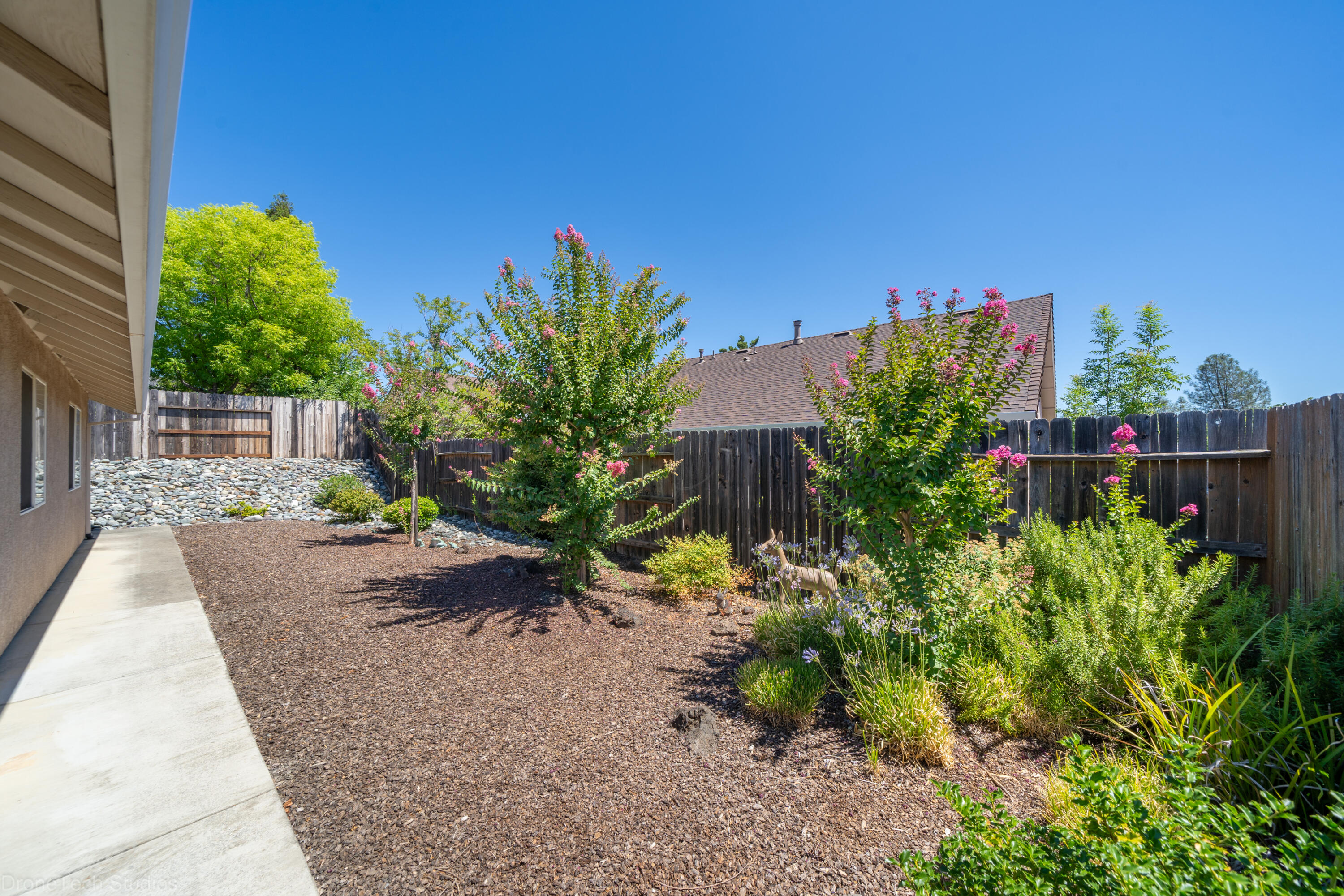 662 Volcano View Trail Redding, CA 96003 - Photo 4 of 26 front view of a house with a yard