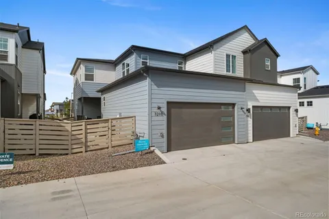 a front view of a house with a garage