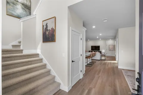 a view of a living room and wooden floor
