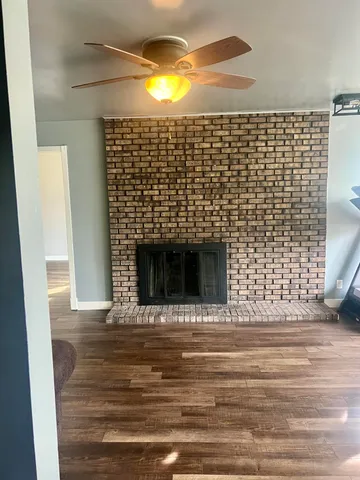 an empty room with a empty space and a window