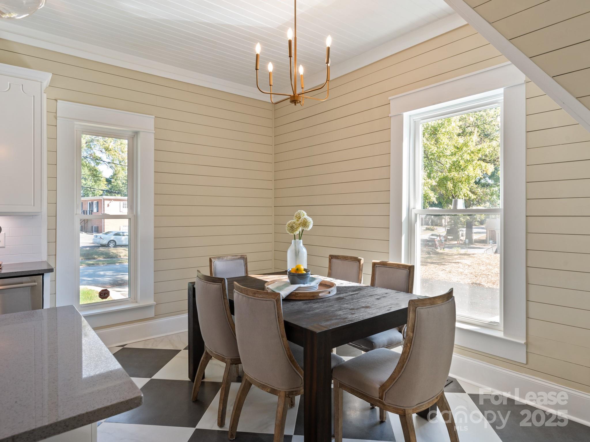 402 South Chester Street Gastonia, NC 28052 - Photo 21 of 48 a view of a dining room with furniture window and outside view