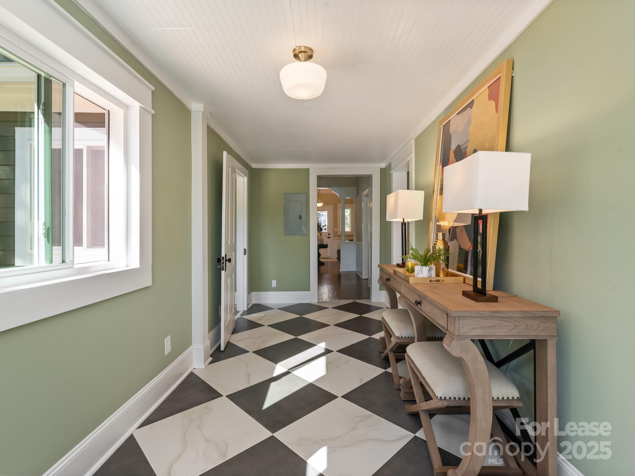 402 South Chester Street Gastonia, NC 28052 - Photo 28 of 48 a view of a workspace with furniture and a window