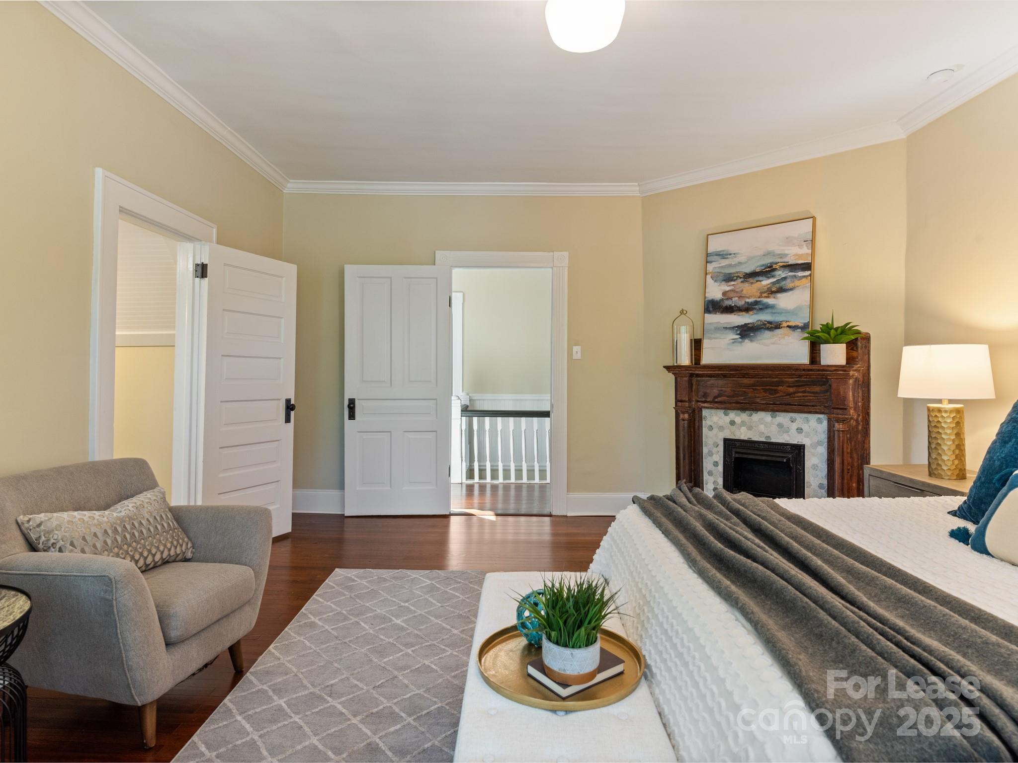 402 South Chester Street Gastonia, NC 28052 - Photo 34 of 48 a living room with furniture and a fireplace
