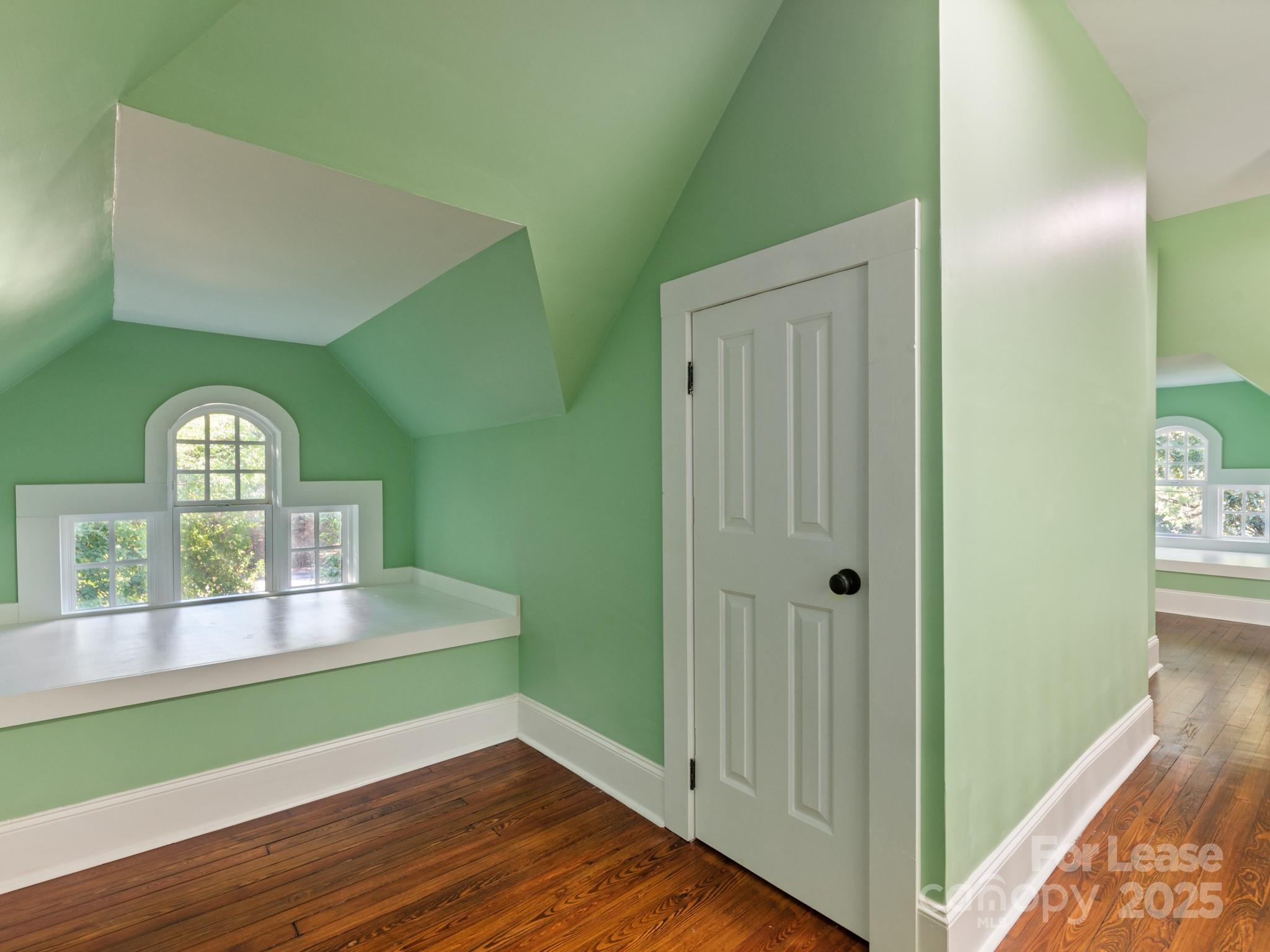 402 South Chester Street Gastonia, NC 28052 - Photo 48 of 48 a view of a room with window and wooden floor