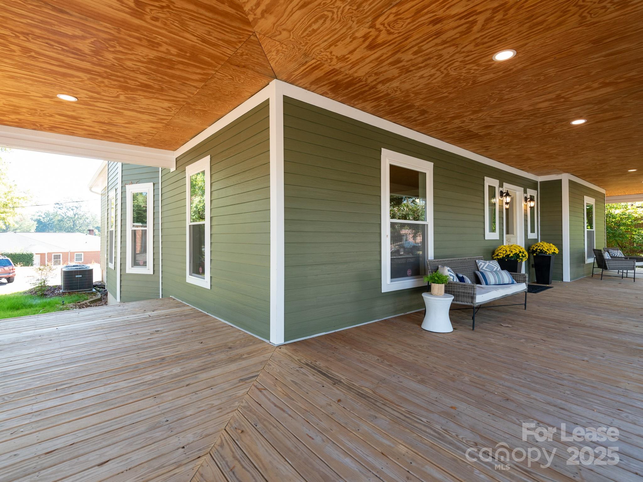 402 South Chester Street Gastonia, NC 28052 - Photo 7 of 48 a front view of a house with garden