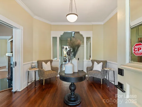 a view of a livingroom with furniture and a table