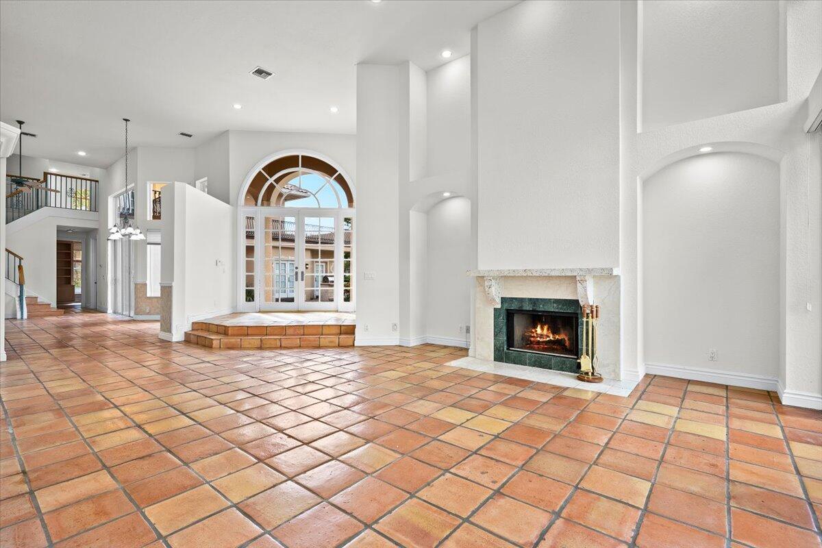 3241 Northwest 63rd Street Boca Raton, FL 33496 - Photo 17 of 75 a view of living room with furniture and a fireplace