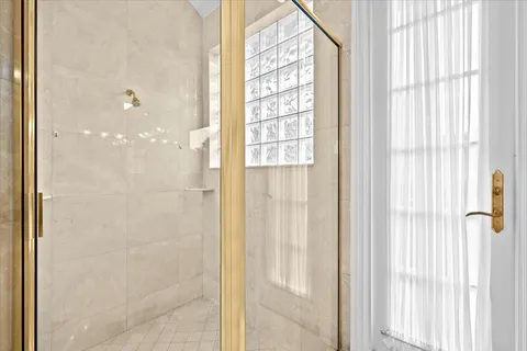 a view of a house with a yard porch and sitting area