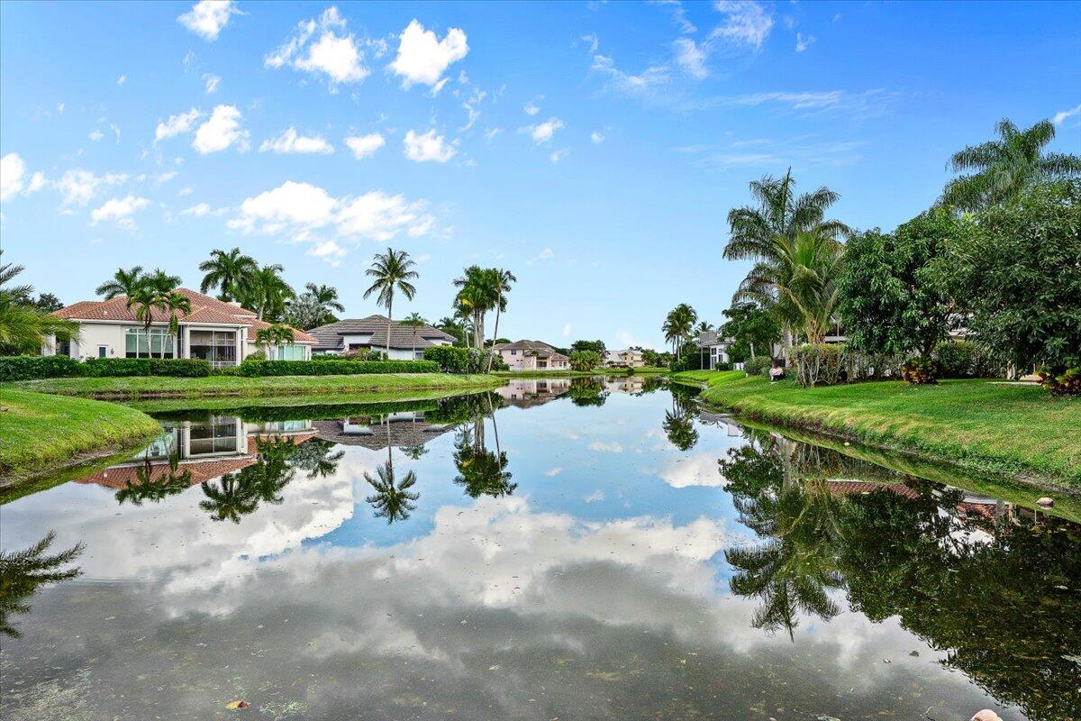 3241 Northwest 63rd Street Boca Raton, FL 33496 - Photo 63 of 75 a view of a lake with outdoor space