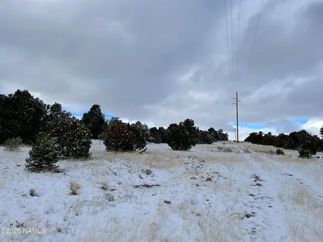 a view of a dry yard of mountains and valleys